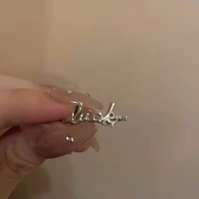 Lucky Script Ring – Minimalist Charm with Geometric Grace